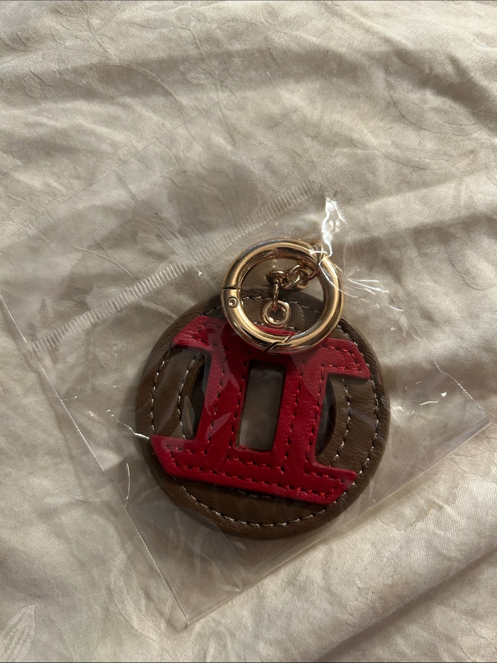 Round Leather Key & Card Holder with Red Gemini  Accent